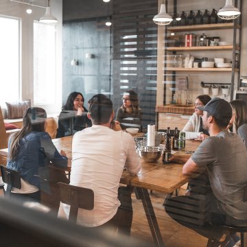 a marketing team having a meeting in a coffee lounge